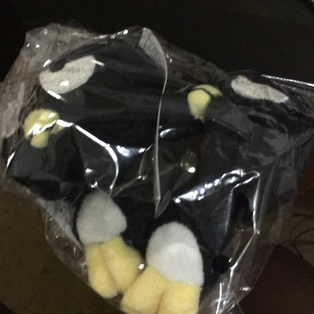 Pyoconoru black cute tiny penguin plush.